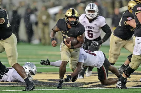 Oct 14, 2023; West Point, New York, USA; Army Black Knights running back Tyrell Robinson (21) rushes the ball against the Troy Trojans during the second half at Michie Stadium. Mandatory Credit: Danny Wild-USA TODAY Sports