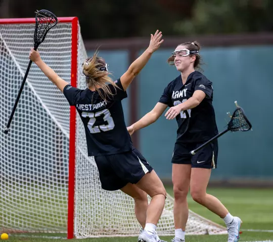 Stanford, CA - March 9, 2024: Allison Reilly and Brigid Duffy during a lacrosse match between Army West Point and Stanford University at Cagan Stadium. Stanford won the match 17-8.