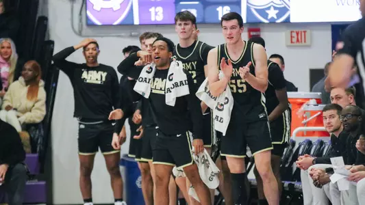 Bench Celebrates Strong Bucket Againsst Holy Cross