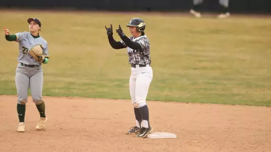 Ashton White Celebrates a Hit with Her Team
