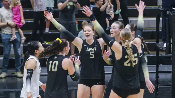 Volleyball Celebrates a Point Inside Gillis Field House