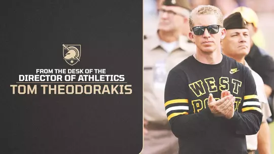 Graphic featuring From the Desk of AD #31 text on the left side and a photo of Director of Athletics Tom Theodorakis clapping on the right side at a football game at Michie Stadium.