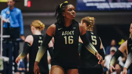 Victoria Kasanganay Listens to Coaching Instructions at Navy