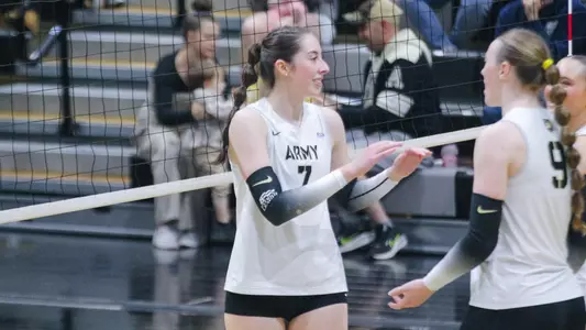 Michelle Parker High Fives Teammates in PL Tournament Win over Lehigh