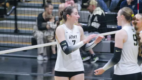 Michelle Parker High Fives Teammates in PL Tournament Win over Lehigh