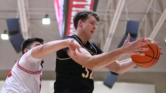 Tate Laczkowski Rebounds the Ball at Cornell