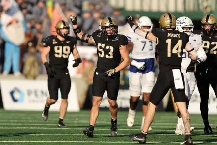 Nov 22, 2025; West Point, New York, USA; Army Black Knights linebacker Kalib Fortner (53) celebrates his tackle against the Tulsa Golden Hurricane during the second half at Michie Stadium. Mandatory Credit: Danny Wild-Imagn Images