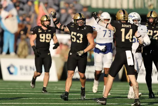 Nov 22, 2025; West Point, New York, USA; Army Black Knights linebacker Kalib Fortner (53) celebrates his tackle against the Tulsa Golden Hurricane during the second half at Michie Stadium. Mandatory Credit: Danny Wild-Imagn Images
