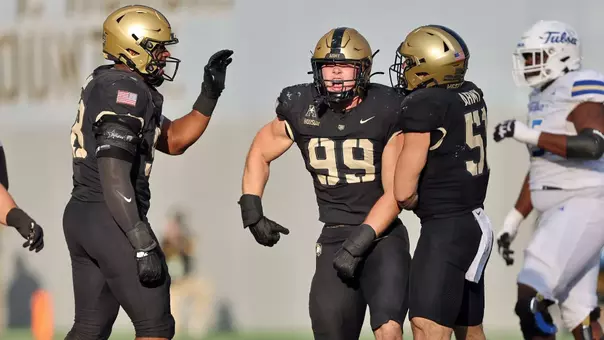 Nov 22, 2025; West Point, New York, USA; Army Black Knights defensive lineman Jack Bousum (99) celebrates his sack against the Tulsa Golden Hurricane during the second half at Michie Stadium. Mandatory Credit: Danny Wild-Imagn Images