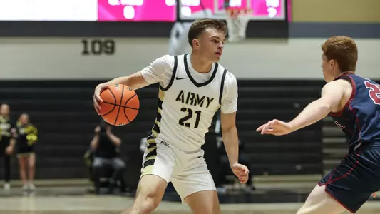 Jackson Mayo Dribbles Past A Defender