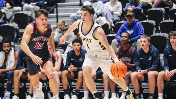 Jackson Furman Drives the Ball Against SUNY Maritiime