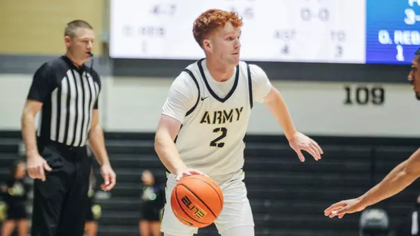 Ryan Curry Drives the Ball against GW