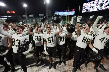 Dec 27, 2025; Boston, MA, USA; the Army Football team celebrates after winning the Wasabi Fenway Bowl at Fenway Park. Mandatory Credit: Danny Wild-Imagn Images