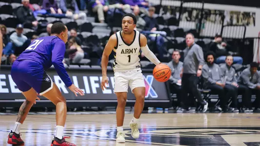 Jalen Rucker Calling a Play Against Holy Cross