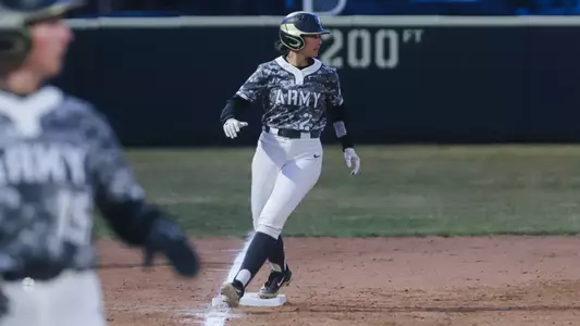 Leila Hurst Rounds Third Base Versus Rider