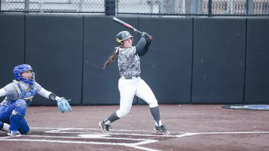 Ashton White Hitting the Ball Against Seton Hall