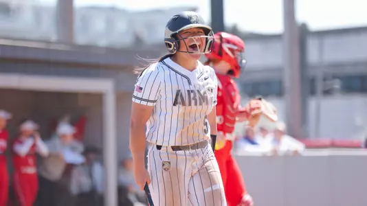 Annie Christiana Celebrating a Run Versus BU