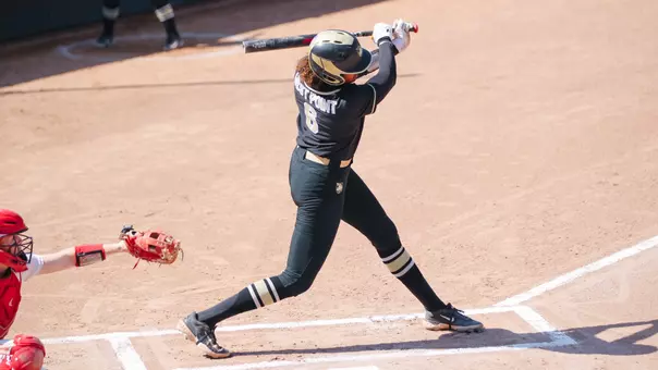 Taylor Brown Swinging at a Pitch Against Boston U