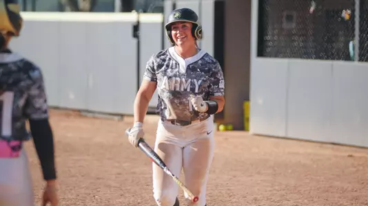 Ashton White Smiles After Scoring a Run Against Bucknell