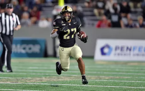 Aug 30, 2024; West Point, New York, USA; Army Black Knights running back Samari Howard (27) runs with the ball against the Lehigh Mountain Hawks during the second half at Michie Stadium. Mandatory Credit: Danny Wild-USA TODAY Sports