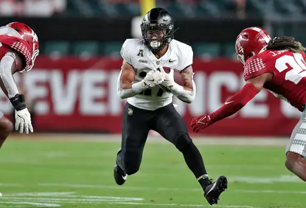 Sep 26, 2024; Philadelphia, Pennsylvania, USA; Army Black Knights running back Samari Howard (27) carries the ball against the Temple Owls during the first half at Lincoln Financial Field. Mandatory Credit: Danny Wild-Imagn Images