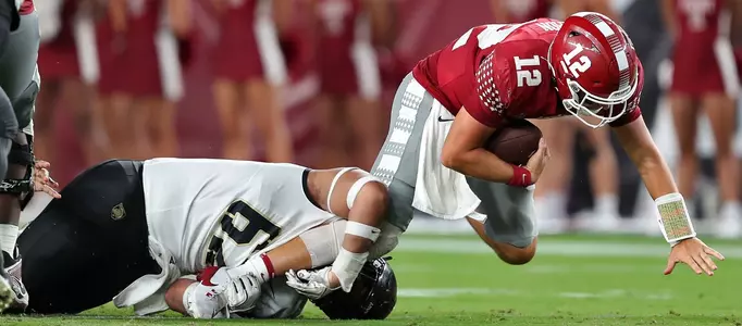 Sep 26, 2024; Philadelphia, Pennsylvania, USA; Temple Owls quarterback Evan Simon (12) is sacked by Army Black Knights defensive lineman Jacob Tuioti (62) during the first half at Lincoln Financial Field. Mandatory Credit: Danny Wild-Imagn Images