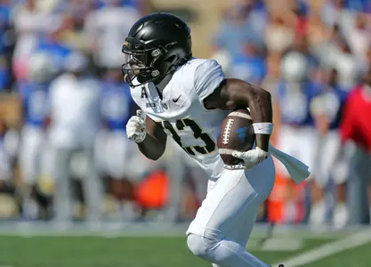 Oct 5, 2024; Tulsa, Oklahoma, USA; Army Black Knights running back Lloyd Benson III (23) returns a kick against the Tulsa Golden Hurricane during the first half at Skelly Field at H.A. Chapman Stadium. Mandatory Credit: Danny Wild-Imagn Images