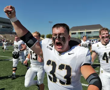 Oct 5, 2024; Tulsa, Oklahoma, USA; Army Black Knights running back Jake Rendina (33) celebrates a 49-7 win against the Tulsa Golden Hurricane at Skelly Field at H.A. Chapman Stadium. Mandatory Credit: Danny Wild-Imagn Images