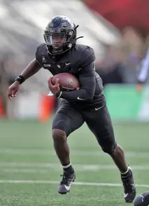 Nov 2, 2024; West Point, New York, USA; Army Black Knights quarterback Dewayne Coleman (10) carries the ball against the Air Force Falcons during the first half at Michie Stadium. Mandatory Credit: Danny Wild-Imagn Images