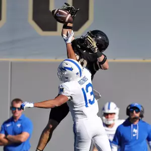 Nov 2, 2024; West Point, New York, USA; Army Black Knights defensive back Casey Larkin (20) swats away a pass intended for Air Force Falcons wide receiver Jared Roznos (13) during the second half at Michie Stadium. The play was called for pass interference. Mandatory Credit: Danny Wild-Imagn Images