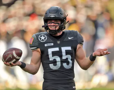 Dec 14, 2024; Landover, Maryland, USA; Army Black Knights long snapper Owen Walter (55) smiles during the first half of the the 125th Army-Navy game at Northwest Stadium. Mandatory Credit: Danny Wild-Imagn Images
