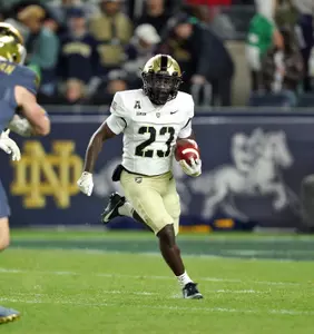 Nov 23, 2024; New York, New York, USA; Army Black Knights running back Lloyd Benson III (23) carries the ball against the Notre Dame Fighting Irish during the second half at Yankee Stadium. Mandatory Credit: Danny Wild-Imagn Images