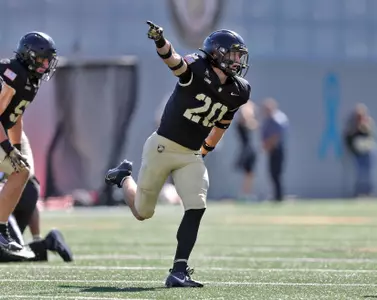 Oct 12, 2024; West Point, New York, USA; Army Black Knights defensive back Casey Larkin (20) celebrates his first interception against the UAB Blazers during the first half at Michie Stadium. Mandatory Credit: Danny Wild-Imagn Images