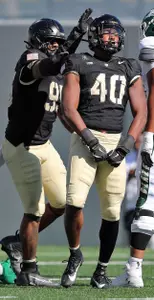 Oct 12, 2024; West Point, New York, USA; Army Black Knights linebacker Eric Ford (40) celebrates his sack of UAB Blazers quarterback Jalen Kitna (17) during the first half at Michie Stadium. Mandatory Credit: Danny Wild-Imagn Images