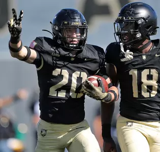 Oct 12, 2024; West Point, New York, USA; Army Black Knights defensive back Casey Larkin (20) celebrates his second interception of the game during the first half against the UAB Blazers at Michie Stadium. Mandatory Credit: Danny Wild-Imagn Images