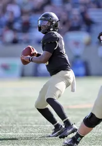 Oct 12, 2024; West Point, New York, USA; Army Black Knights quarterback Dewayne Coleman (10) looks to pass against the UAB Blazers during the second half at Michie Stadium. Mandatory Credit: Danny Wild-Imagn Images