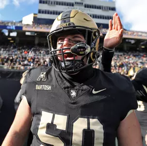 Nov 30, 2024; West Point, New York, USA; Army Black Knights offensive lineman Braden Bartosh (50) screams on the sidelines during the first half against the UTSA Roadrunners at Michie Stadium. Mandatory Credit: Danny Wild-Imagn Images
