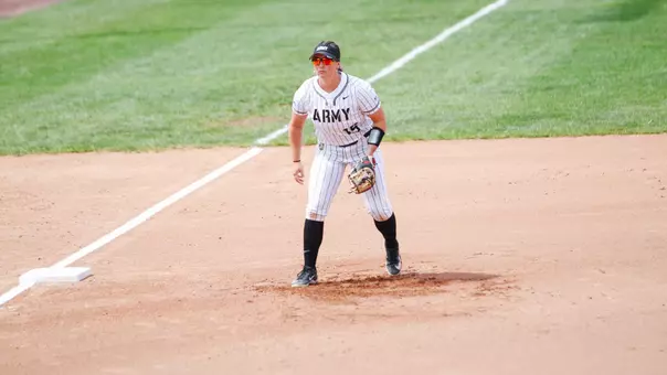 Ashton White Surveys a Hitter at the Army Softball Complex