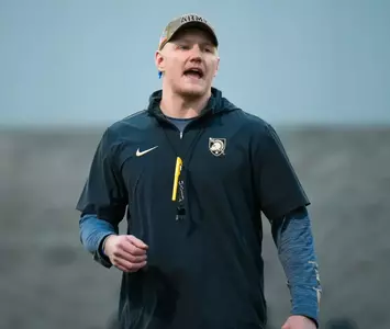 Assistant Coach Seth Hestness coaching during Spring Practice in 2025