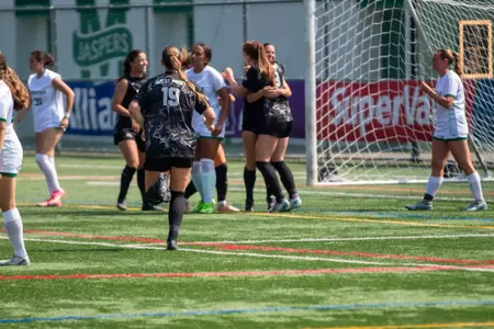 #19 Ailyn Rowe runs to celebrate a goal with teammates in Army's 4-1 victory over Manhattan on August 17, 2025