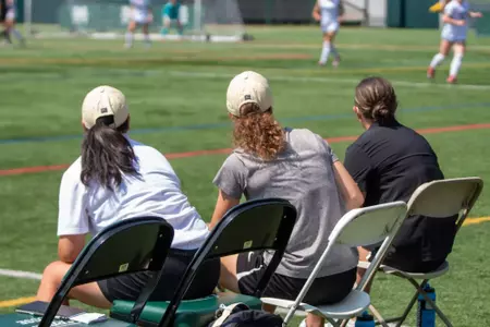 Head Coach Tracy Chao, Assistant Coach Kerry Edwards and 2nd LT Kaelan Bradley look on in Army's 4-1 victory over Manhattan on August 17, 2025