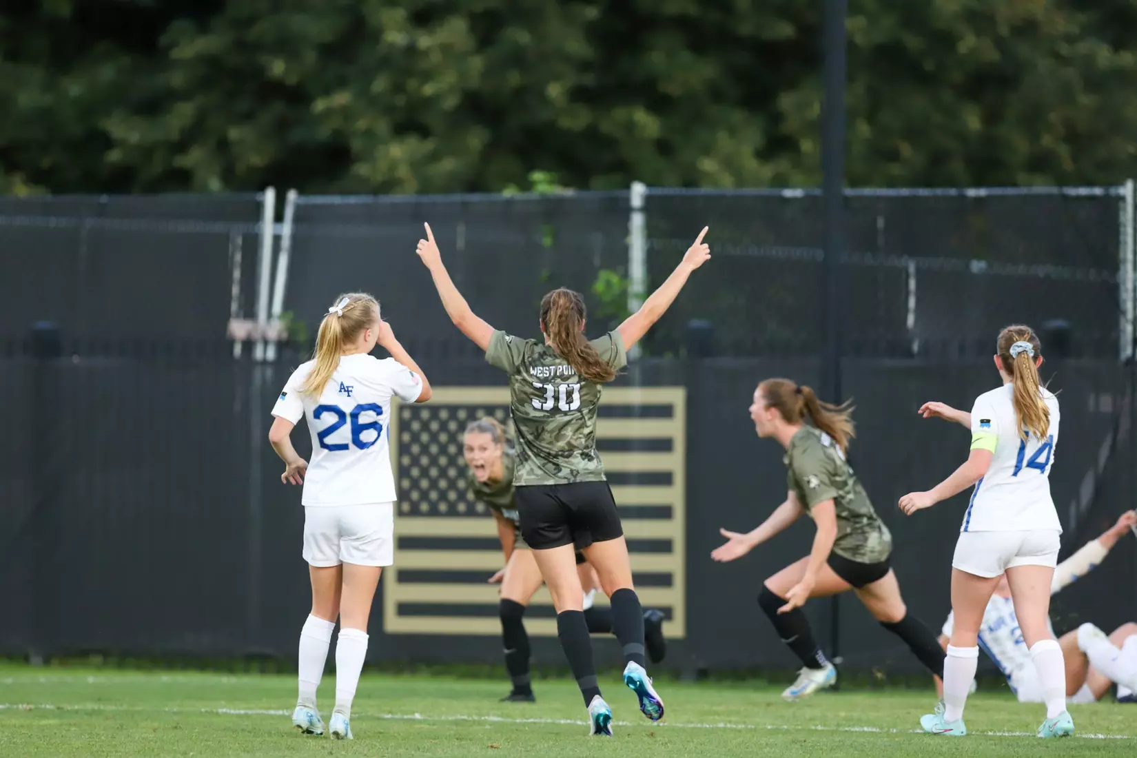 #30 Brigid Duffy and #9 Sophia celebrate a goal with #11 Sabrina Rogers in Army West Point's 2-1 victory over Air Force on Aug. 21, 2025