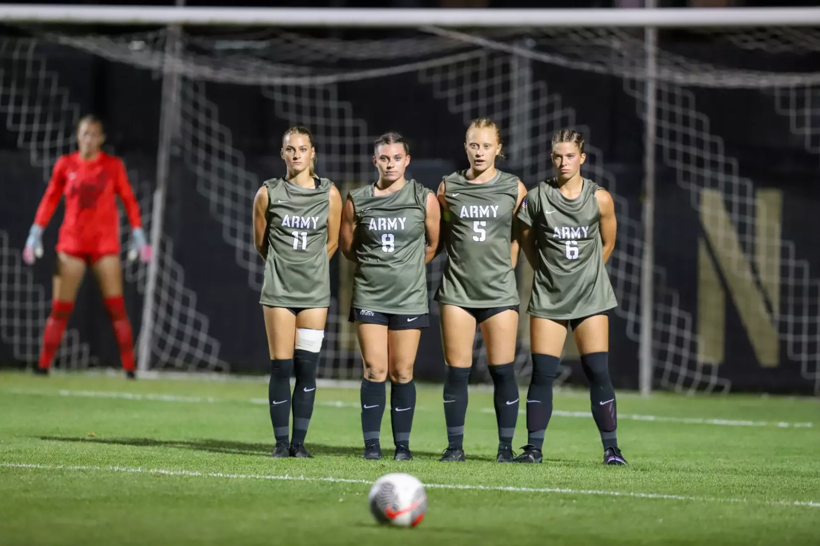#11 Sabrina Rogers, #8 Grace Burns, #5 Bella Cooke and #6 Ragon Francy line up to block a free kick in Army West Point's 2-1 victory over Air Force on Aug. 21, 2025