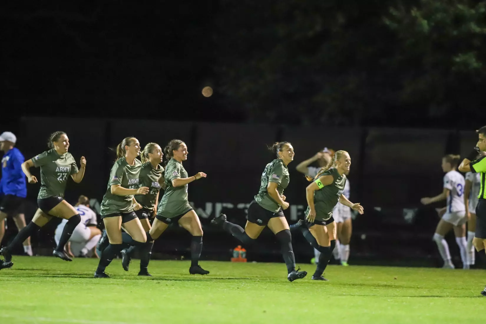 Army players run to celebrate in Army West Point's 2-1 victory over Air Force on Aug. 21, 2025