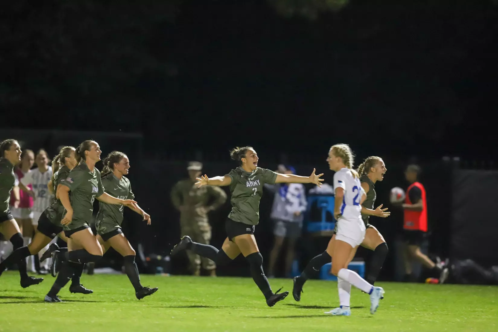 Army players run to celebrate in Army West Point's 2-1 victory over Air Force on Aug. 21, 2025