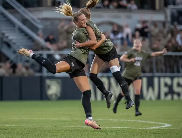 #10 Grace Pohlidal and #11 Sabrina Rogers celebrate a goal in Army West Point's 2-1 victory over Air Force on Aug. 21, 2025
