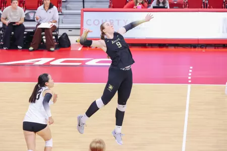 Mackenzie Lynch Attacks the Ball Against Akron