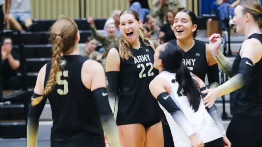 Breelyn Bender Celebrates Kill with Teammates