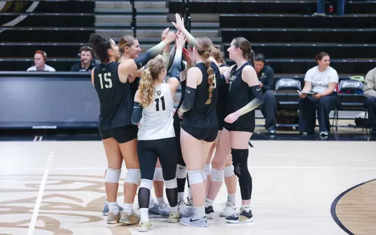 Team Huddles Before Matchup