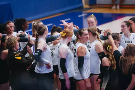 Volleyball Team Huddle at American U